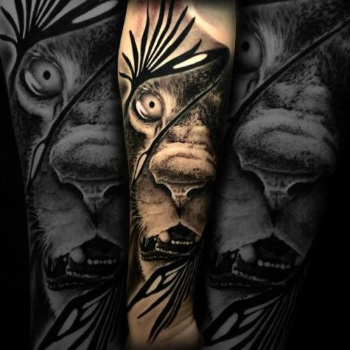 tatuaje realista gueopardo ramas